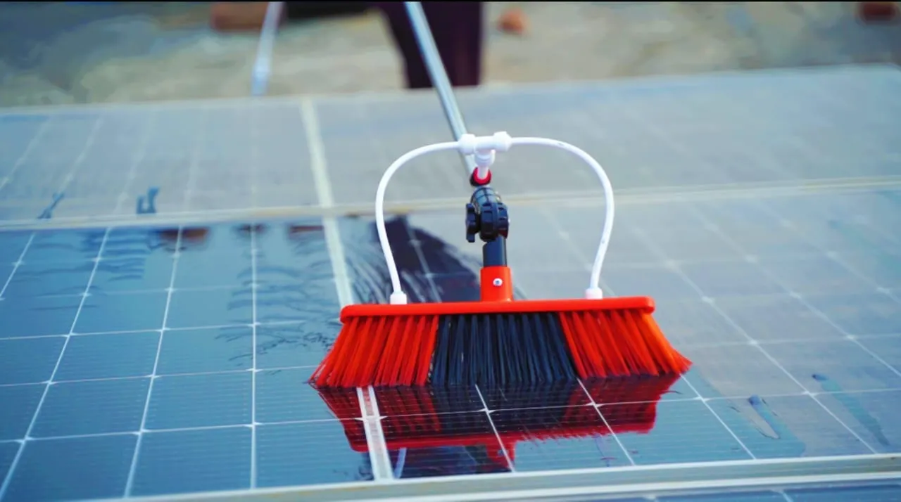 clean-solar-panels-with-brush